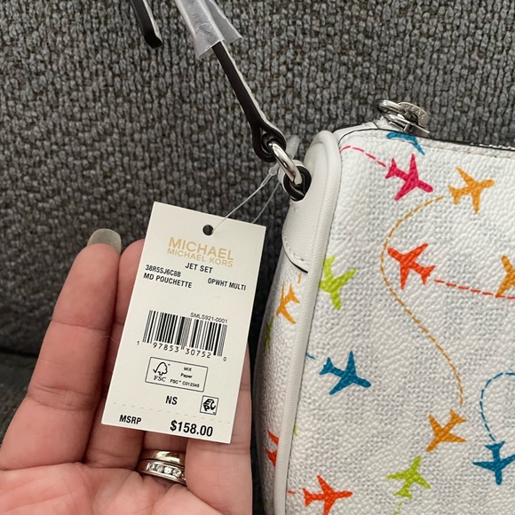 Michael Kors white jet set Airplane purse - Picture 2 of 6